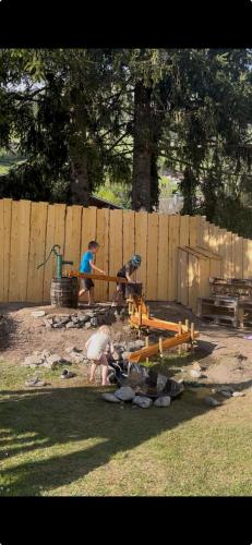a group of people working on a construction site at Apartments Pihapperhof in Mittersill
