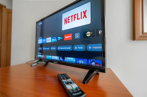 TV a/nebo společenská místnost v ubytování Albergo Settebello