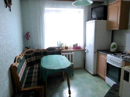 מטבח או מטבחון ב-Apartments na Gvardeyskom