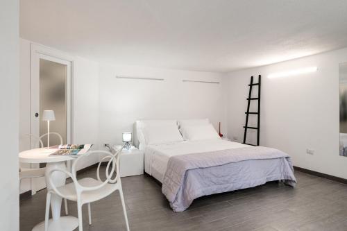 Ένα ή περισσότερα κρεβάτια σε δωμάτιο στο WLofts 11, 12 & 14 by Klodge