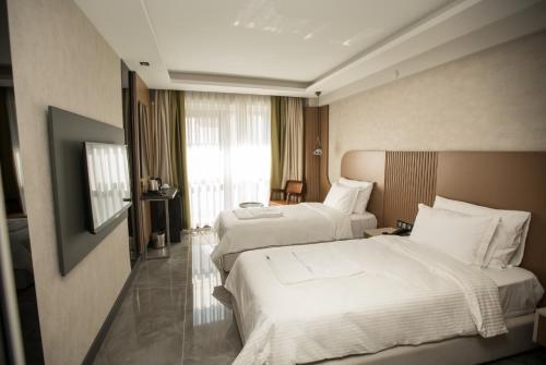 Televisyen dan/atau pusat hiburan di Alberello Otel