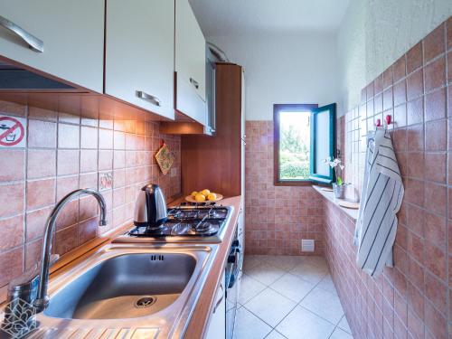 Η κουζίνα ή μικρή κουζίνα στο La Rotonda Cottages - Klodge