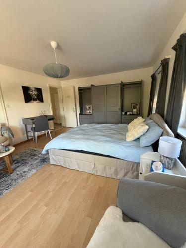 Postel nebo postele na pokoji v ubytování MTL Schweiz Apartments