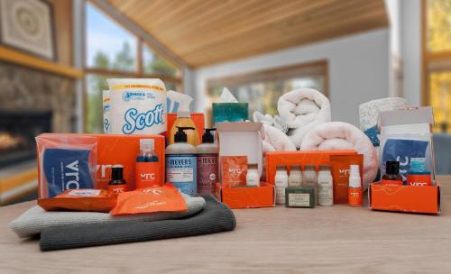 a pile of products sitting on a table at Wolf Point Cabin in Boulder Junction WI in Sayner
