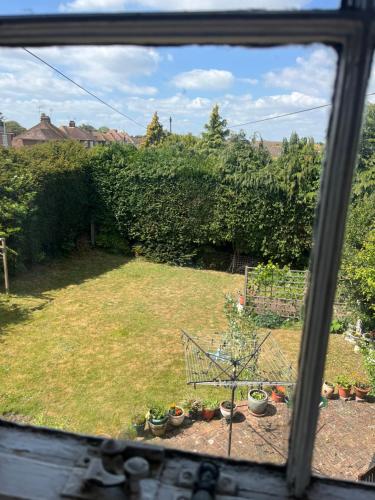 a view of a yard from a window at Chilton Manor House in Murston