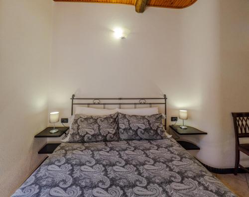 Postel nebo postele na pokoji v ubytování Macaia Room #1 with AC