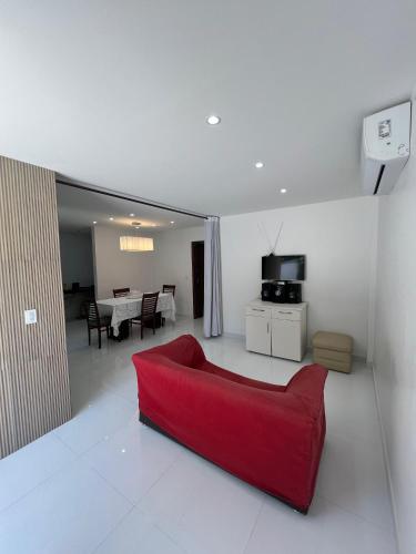 TV a/nebo společenská místnost v ubytování Residencial Pousada Quintas do Calhau