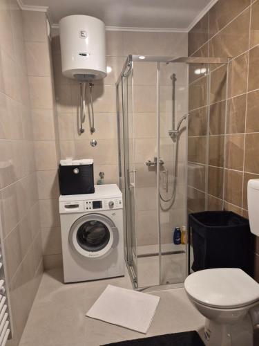 Koupelna v ubytování Muki Oaza Apartman