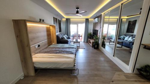 Ένα ή περισσότερα κρεβάτια σε δωμάτιο στο Estudio centro Torremolinos Down town