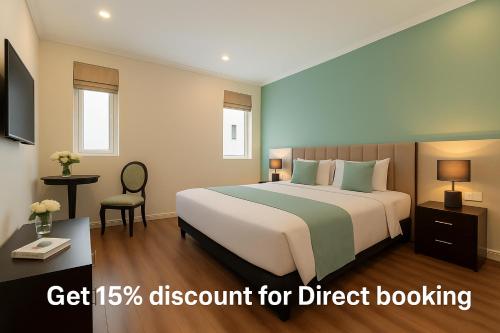 Ένα ή περισσότερα κρεβάτια σε δωμάτιο στο Omina Hotel & Travel