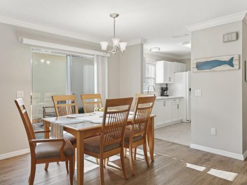 a kitchen and dining room with a table and chairs at 1315 Z2B VILLAGE OF RIO GRANDE by REMAX Premier in The Villages