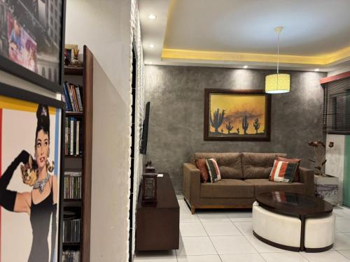 Χώρος καθιστικού στο Casa Duplex Aconchegante