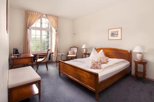 Postel nebo postele na pokoji v ubytování Hotel Stadthaus