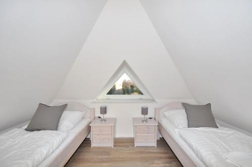 Voodi või voodid majutusasutuse Doppelhaushälfte Böhler Wiesenblick toas