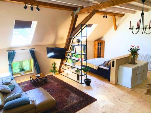Posezení v ubytování Stilvoll eingerichtetes Studio in historischem Bauernhaus, voll ausgestattet inmitten der Natur auf 75 qm