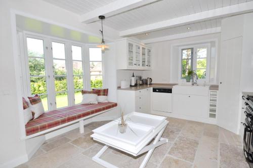 Kuchyň nebo kuchyňský kout v ubytování Ferienhaus Amselkate