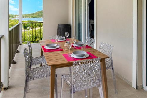 Et tv og/eller underholdning på Vue mer Ilet Pinel - Appartement 4p 1ch