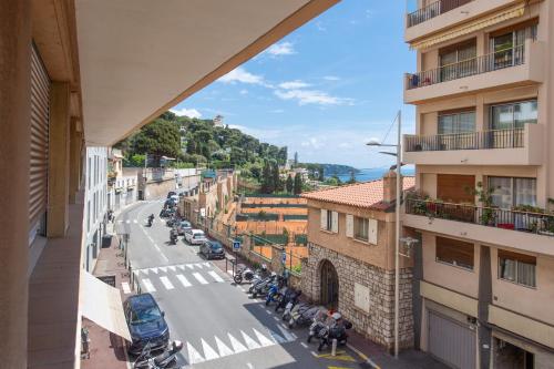 a view of a city street from a building at 2mn Monaco - Coquet appartement rénové - DM in Roquebrune-Cap-Martin