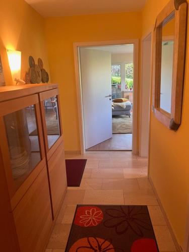 a hallway with a door leading into a kitchen with a table at Frankenberg-am-Wald Frankenberg an der Eder in Frankenberg