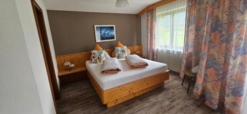 Postel nebo postele na pokoji v ubytování Gästehaus Scharler