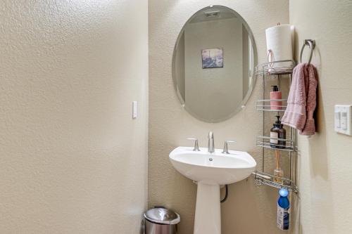 a bathroom with a sink and a mirror at Family Home with Patio and Fenced Yard in Brentwood in Brentwood