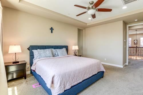 a bedroom with a bed and a ceiling fan at Family Home with Patio and Fenced Yard in Brentwood in Brentwood