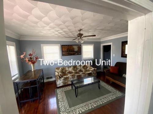 a living room with a couch and a ceiling at Derby City Getaway in Louisville
