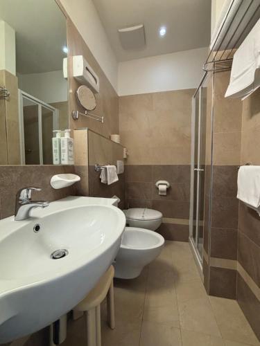 Koupelna v ubytování Abahotel