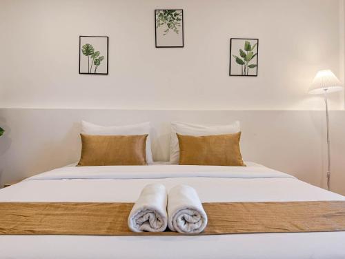 Katil atau katil-katil dalam bilik di Inspire House Hotel