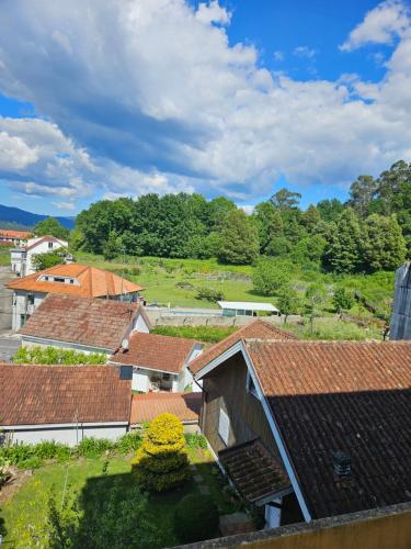 an overhead view of a village with roofs at El pisito de iker in Mondariz