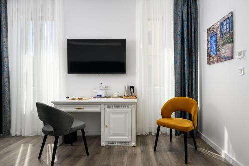 TV/Unterhaltungsangebot in der Unterkunft Boutique Hotel Golden Key - Poreč - Bed & Breakfast
