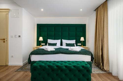 Ein Bett oder Betten in einem Zimmer der Unterkunft Boutique Hotel Golden Key - Poreč - Bed & Breakfast