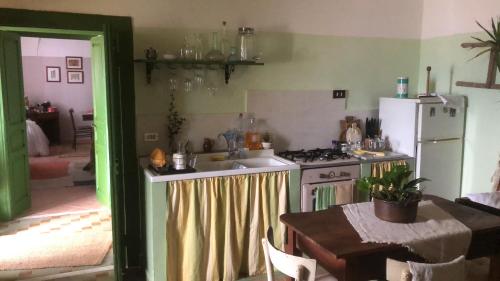 Kuchyň nebo kuchyňský kout v ubytování La Casa di Civita