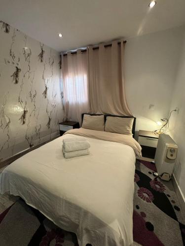 En eller flere senge i et værelse på Casa amueblado