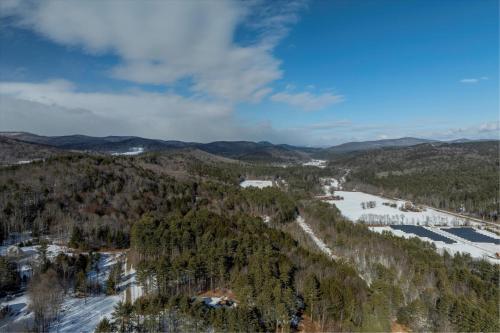 an aerial view of a mountain with snow and trees at Spacious 5-bedroom Chalet with AC and WiFi in charming Chester in Chester