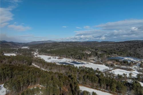an aerial view of a ski resort in the snow at Spacious 5-bedroom Chalet with AC and WiFi in charming Chester in Chester