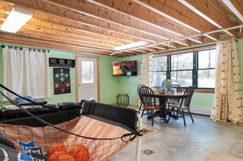 a living room with a couch and a table at Spacious 5-bedroom Chalet with AC and WiFi in charming Chester in Chester