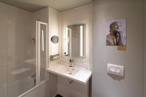 Koupelna v ubytování Hôtel Mercure Montauban