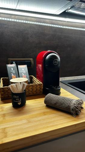 a toaster sitting on top of a wooden counter next to at Villa Paradiso in Isola d'Asti