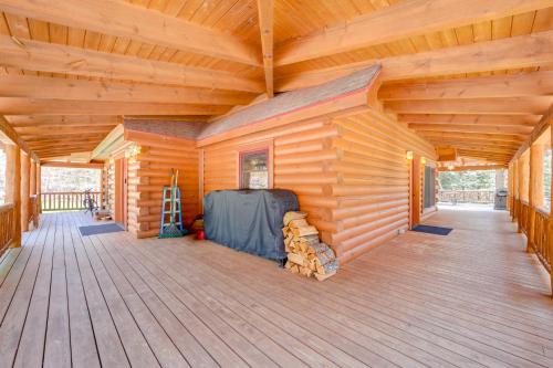 a large wooden cabin with a large wooden ceiling at Hot Tub and Dock Waterfront Cabin in Old Forge! in Old Forge