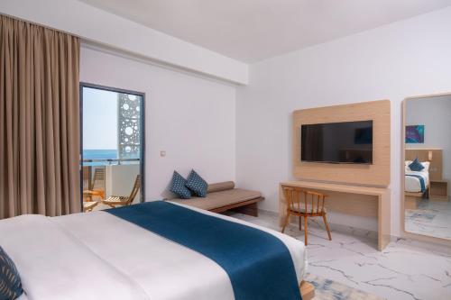 TV/Unterhaltungsangebot in der Unterkunft Arrival Beach and Spa