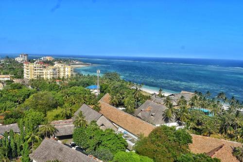 an aerial view of the ocean and a resort at Nyali Fully Furnished Rooms With Swimming pool in Mombasa