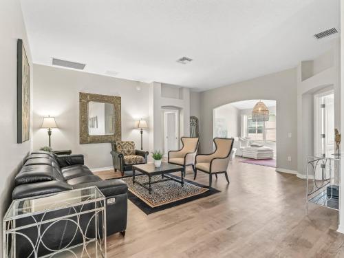 a living room with a couch and a table at 3270 Z2A VILLAGE OF GLENBROOK by REMAX Premier in The Villages