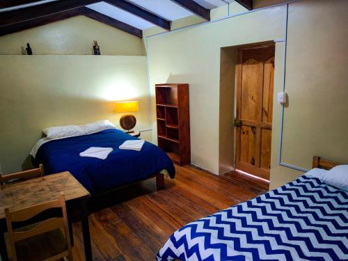 Postel nebo postele na pokoji v ubytování Casa Aguilar