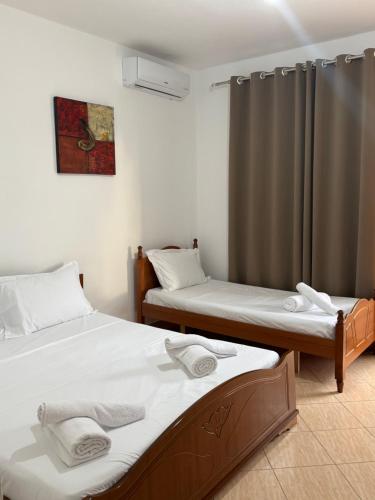Postel nebo postele na pokoji v ubytování Aloha Villa and Suites
