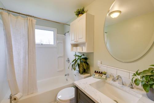 a bathroom with a sink and a toilet and a mirror at Day Trip to Acadia Quiet Coastal Maine Escape in Harrington