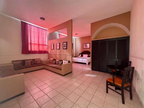 Cama o camas de una habitación en Hotel Marney Aguascalientes