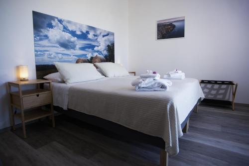 Postel nebo postele na pokoji v ubytování B&B Hill Ranch
