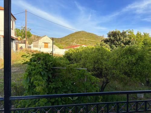a view of a mountain from a house at Villa Geomare in Apolakkiá