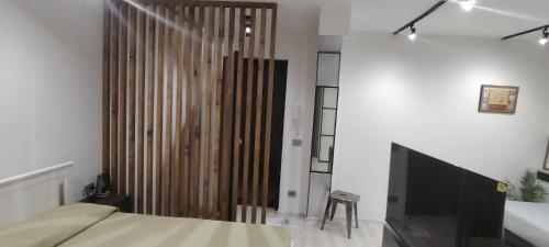 Postel nebo postele na pokoji v ubytování Studio Flat Rome Metro Garbatella